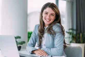 Woman smiling during a customer feedback interview